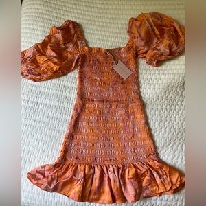 Alexis Lipari smocked mini dress